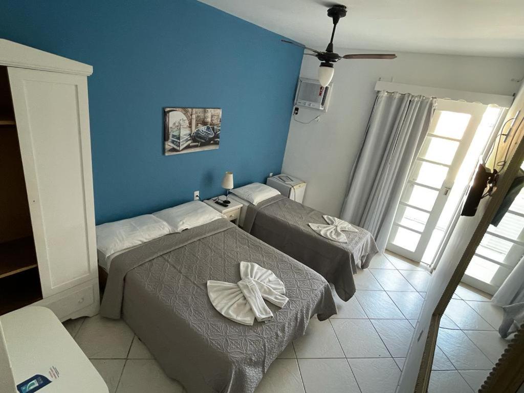 Quarto Triplo com Varanda